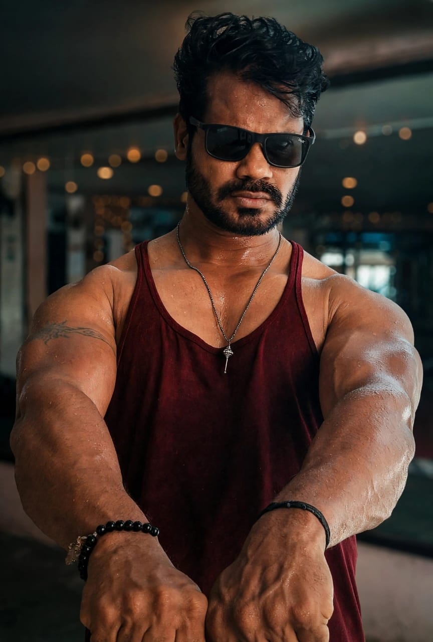 Amdeesh training in a burgundy vest